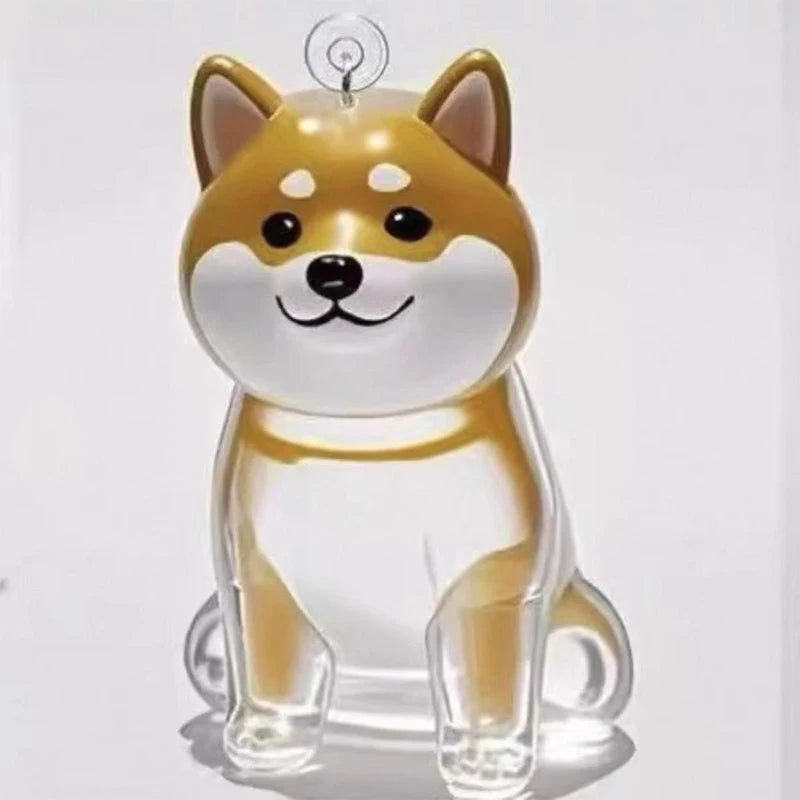 Klare Glasfigur eines Shiba Inu Welpen mit goldenem Fell und weißen Abzeichen, montiert auf einem runden Schlüsselring.