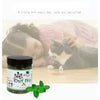 Jar of Cat Nip and Mint Grass used for feline relaxation with a cat nearby