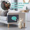 A self-adhesive cat scratching mat is placed on a sofa, with a tabby kitten sitting nearby.