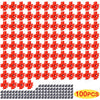 Un jeu de 100 tétines en plastique rouge pour abreuvoirs de poulets automatiques.