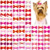 A collection of colorful pet hair bows featuring various patterns and colors tied with gentle rubber bands.