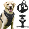A padded black dog traction chest harness displayed next to a golden retriever.