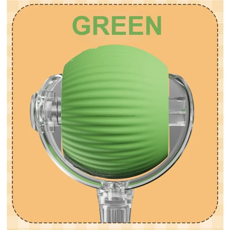 A green automatic rolling interactive ball for cats shown in a close-up view.
