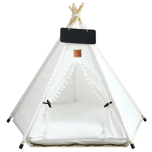 A white teepee pet tent with a removable cushion and a black blackboard on top.