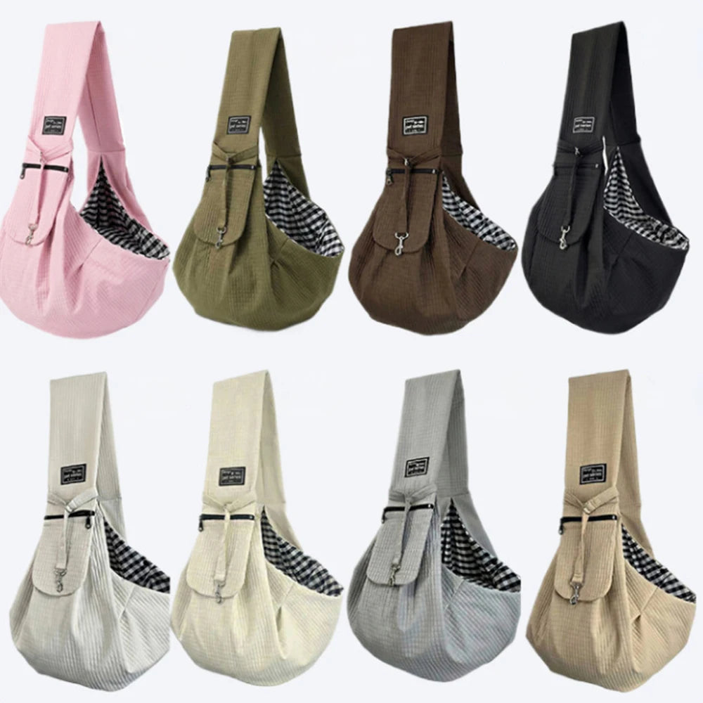 A collection of five crossbody pet carrier bags for dogs and cats in various colors including pink, olive green, brown, black