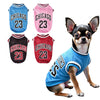 Chihuahua in a blue Chicago 23 vest with various themed shirts.