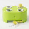 A lime green interactive cat toy with a rotating base and yellow feather accessories.