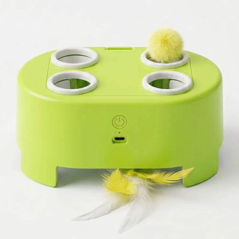 A lime green interactive cat toy with a rotating base and yellow feather accessories.