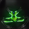 A green LED dog harness with reflective strips is displayed against a dark background.