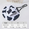 A white and black cow print bucket hat shown with size options for S, M, and L.