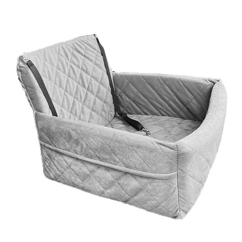 A gray quilted dog car seat with a removable orthopedic cushion.