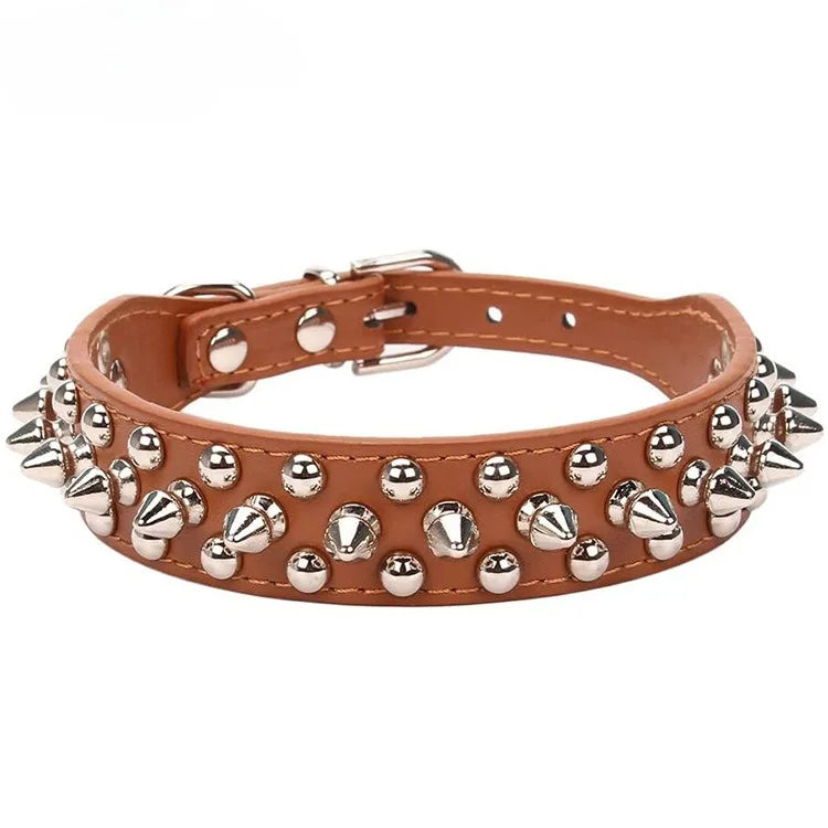 A brown leather dog collar with silver spikes and a buckle closure.