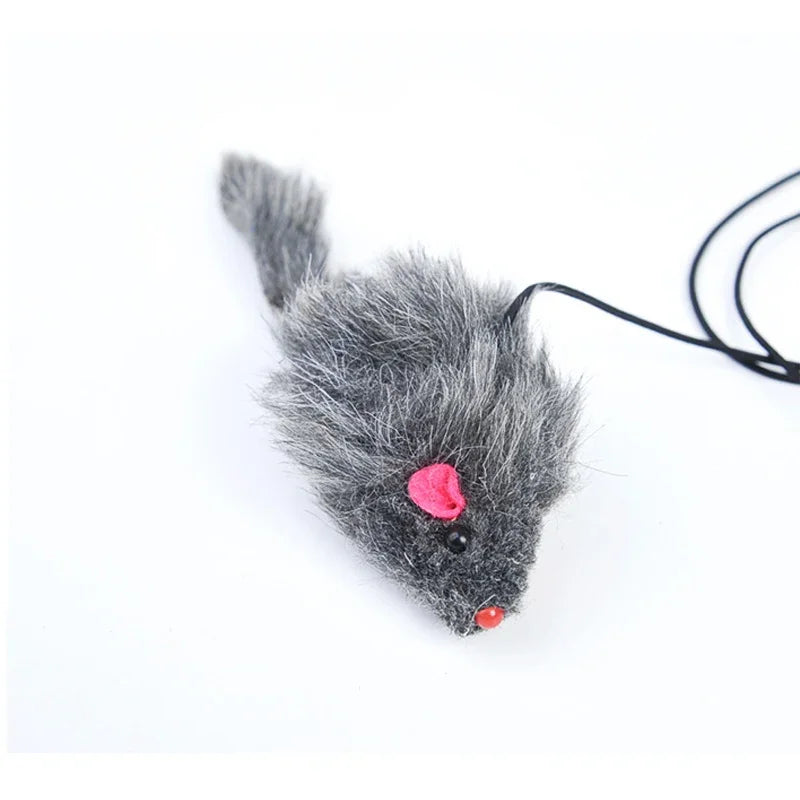 A gray, fluffy cat toy resembling a mouse with pink eyes and a black string attached.