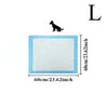 White pet training pads with a blue border and a silhouette of a dog