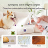 A hand is spraying a synergistic active enzyme complex onto a sofa, mattress, or floor to dissolve stains and remove yellowin