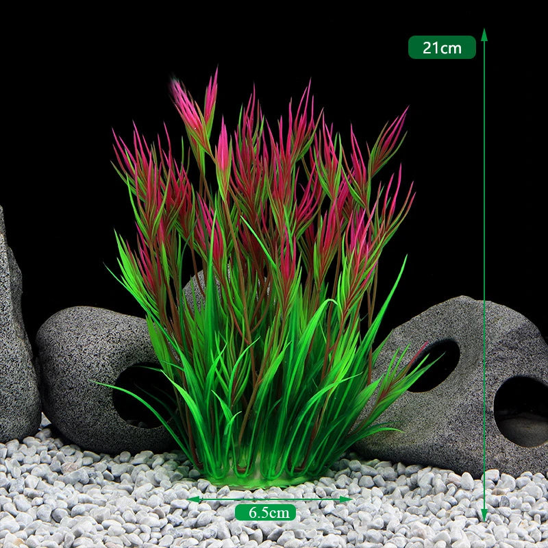 Composition de plantes aquatiques artificielles vert vif et rose dans un décor sombre.