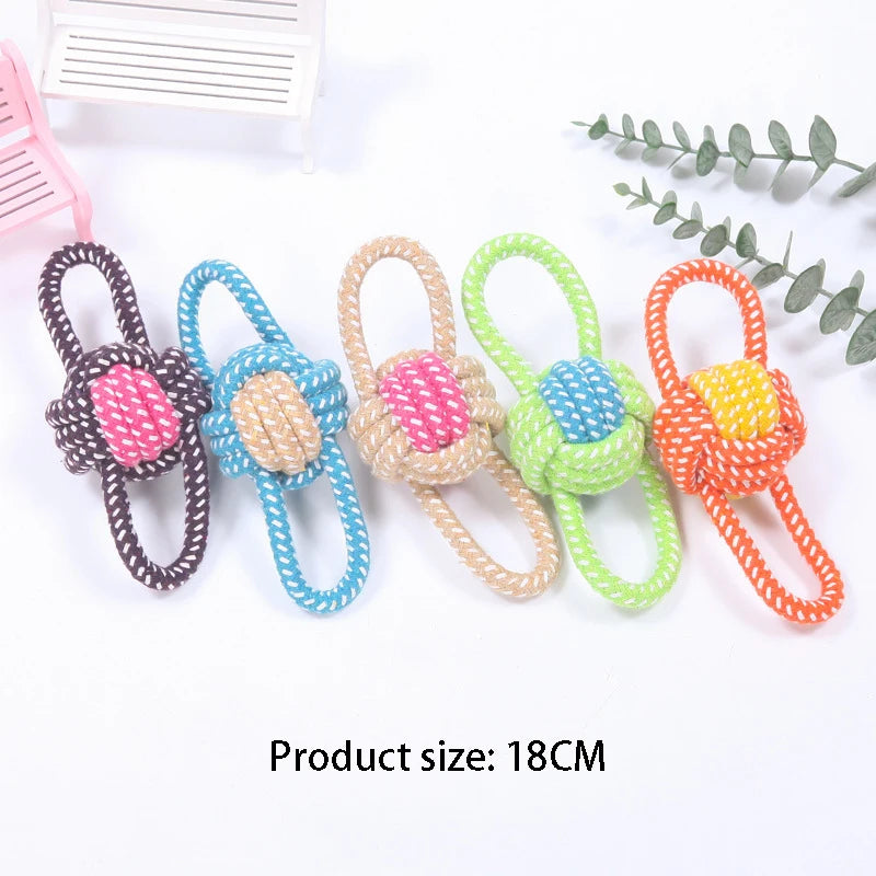 A set of colorful cotton rope dog chew toys for teeth cleaning, featuring pink, blue, beige, green, and orange.