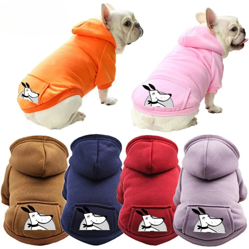 A collection of cozy fleece dog sweatshirts with hoods and pockets in orange, pink, brown, and purple colors.