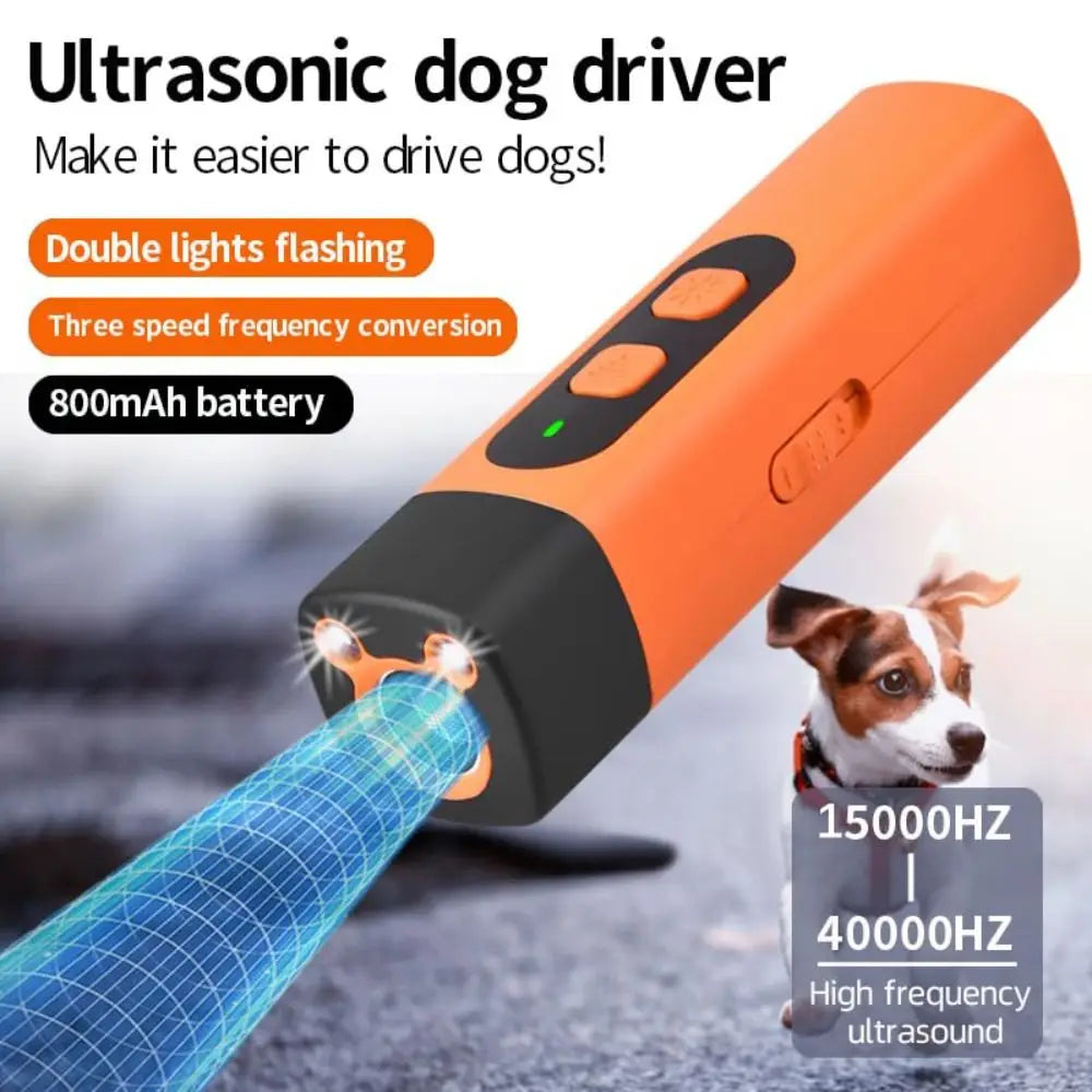An orange ultrasonic dog driver device is shown emitting high frequency ultrasound sound.