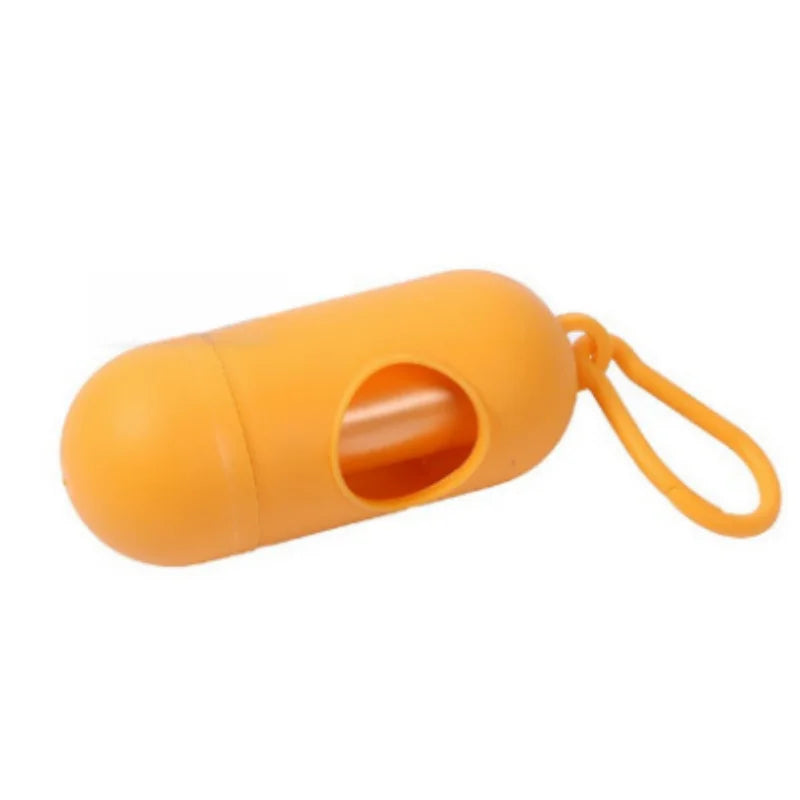 Orange capsule-shaped dog poop bag dispenser with a carabiner clip.