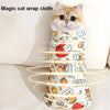 A fluffy orange cat is wrapped in a colorful magic cat wrap cloth for pet use.