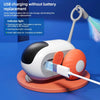 A white automatic pet toy car is shown with an indicator light and a charging cable on a blue surface.
