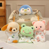 A set of three soft plush toys featuring cartoon animals including a penguin, a rabbit, and a frog.