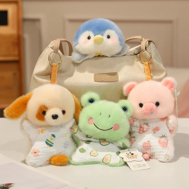 A set of three soft plush toys featuring cartoon animals including a penguin, a rabbit, and a hedgehog.