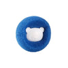 A close-up view of a blue, fuzzy lint removal ball with a white panda face embedded in the center.