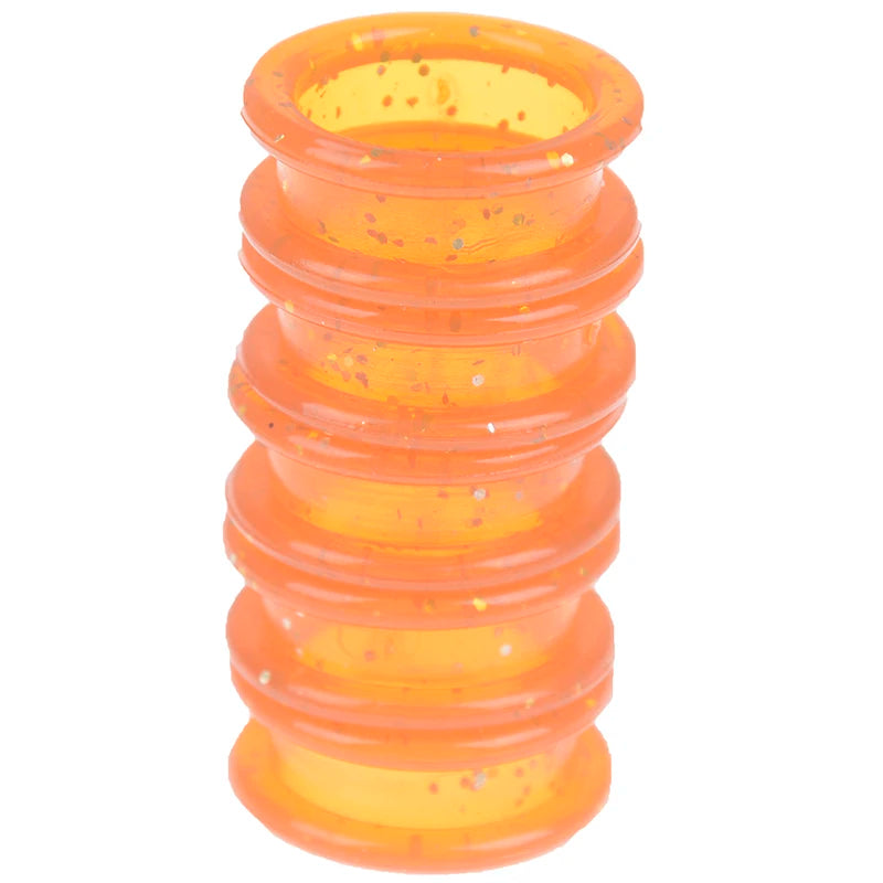 A set of orange silica gel hair scissors stacked in a cylindrical shape.