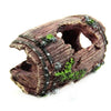 Resin broken barrel fish tank decoration with moss, showing a textured brown object.