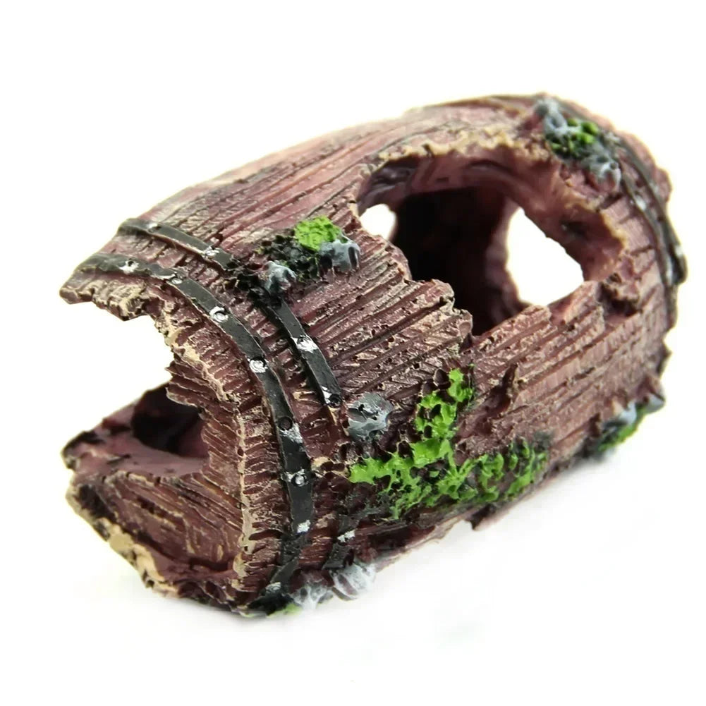 Resin broken barrel fish tank decoration with moss, showing a textured brown object.