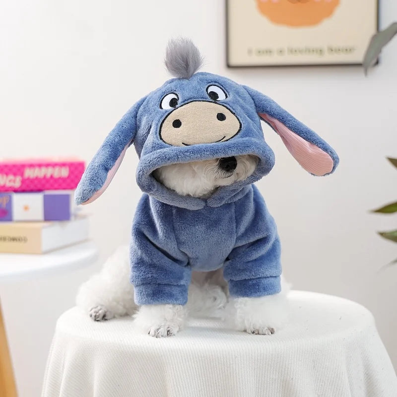 A fluffy blue flannel hoodie for a small dog resembling a cartoon blue donkey.