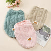 Three cozy fleece pullover sweatshirts for pets in mint green, beige, and pink.