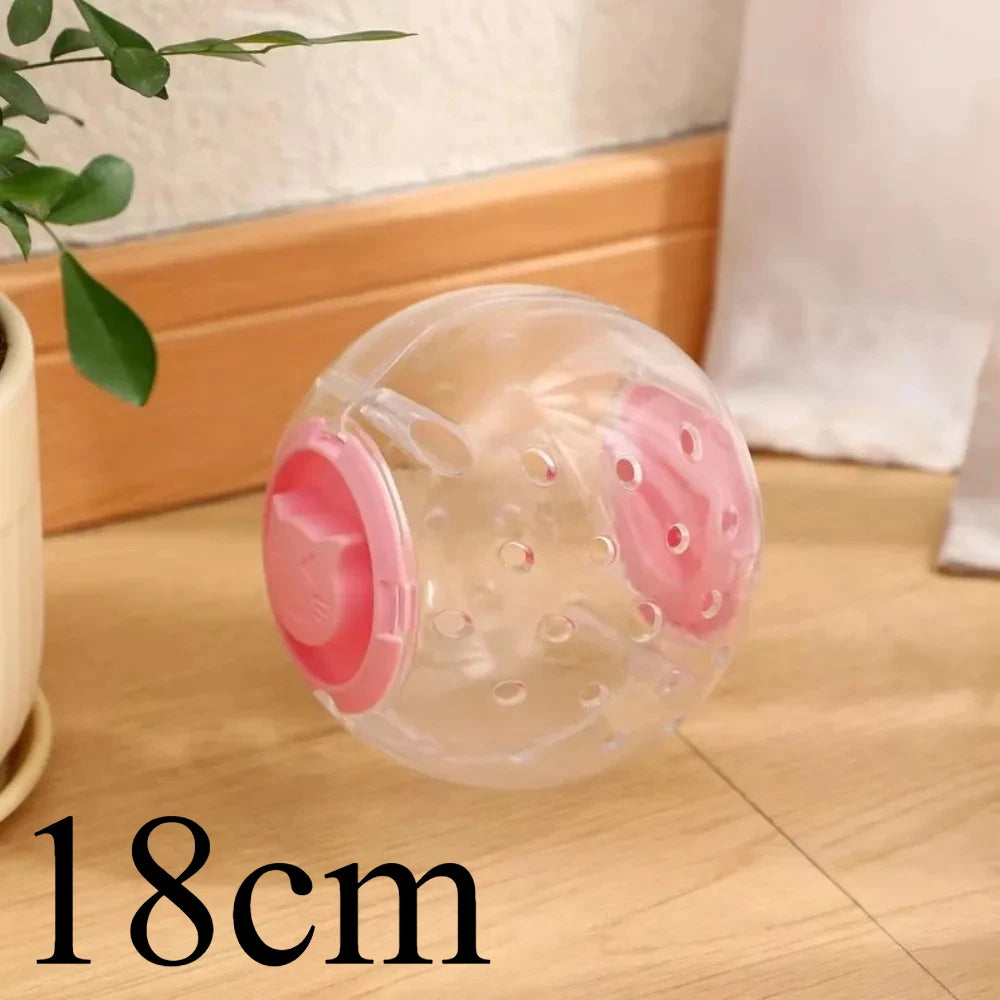 A clear plastic ball with pink accents used for hamster exercise and play.