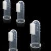 Four silicone finger toothbrushes for dogs shown in various orientations and angles.
