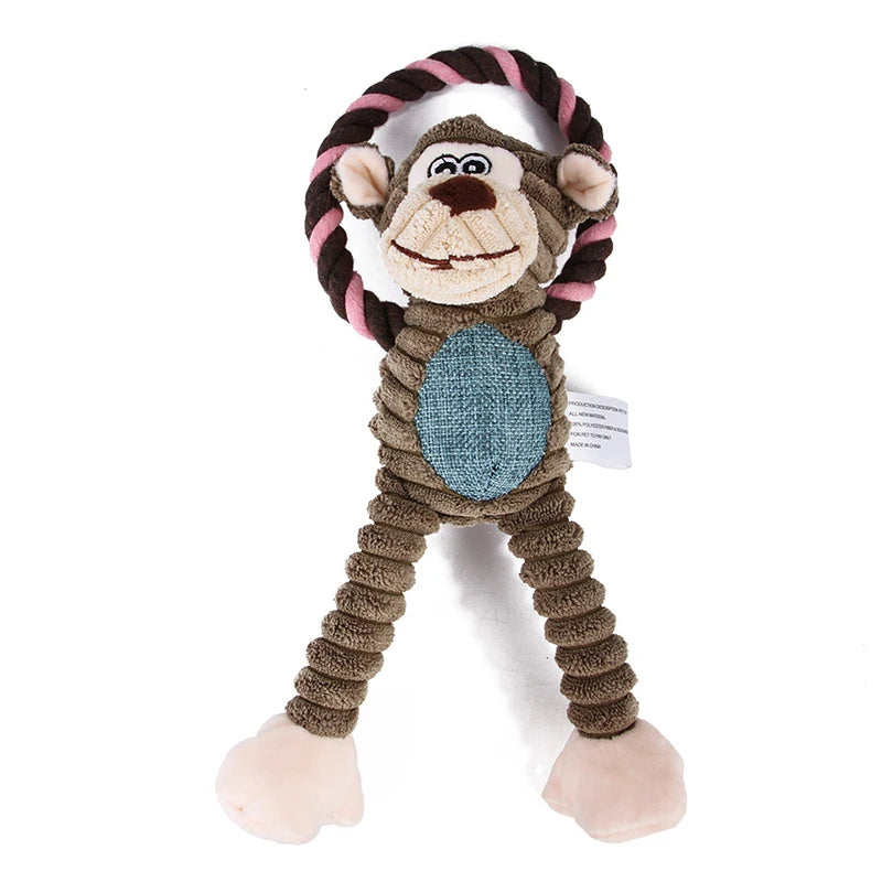 A plush toy resembling a monkey with a bone-like body and striped hair, used as a squeaky chew toy.