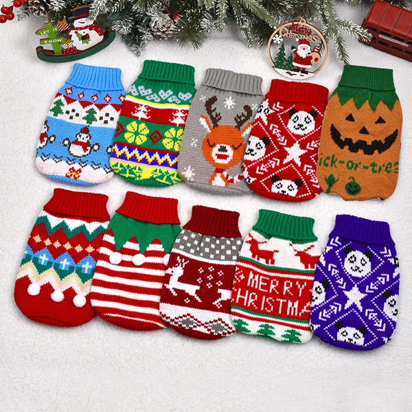 A collection of knitted dog sweaters in various holiday patterns and colors displayed on a white background.