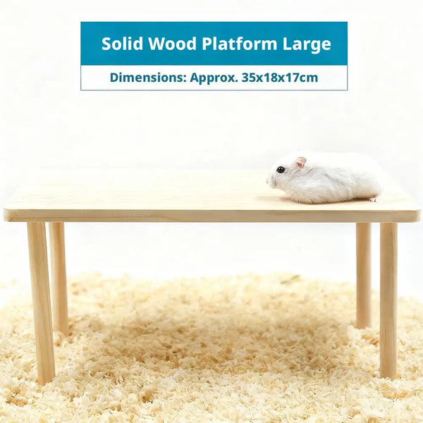 A large solid wood platform for hamsters is shown on a light wooden table.