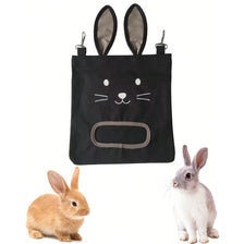 Black heavy duty bunny ears hay feeder with a rabbit toy in the foreground