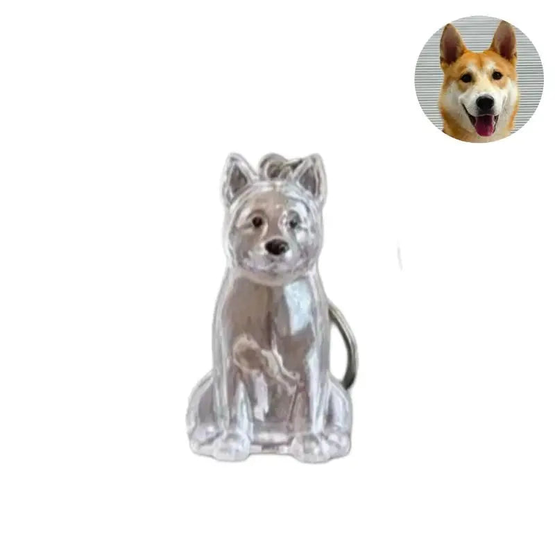 Silver dog hair storage keychain pendant shaped like a dog's head