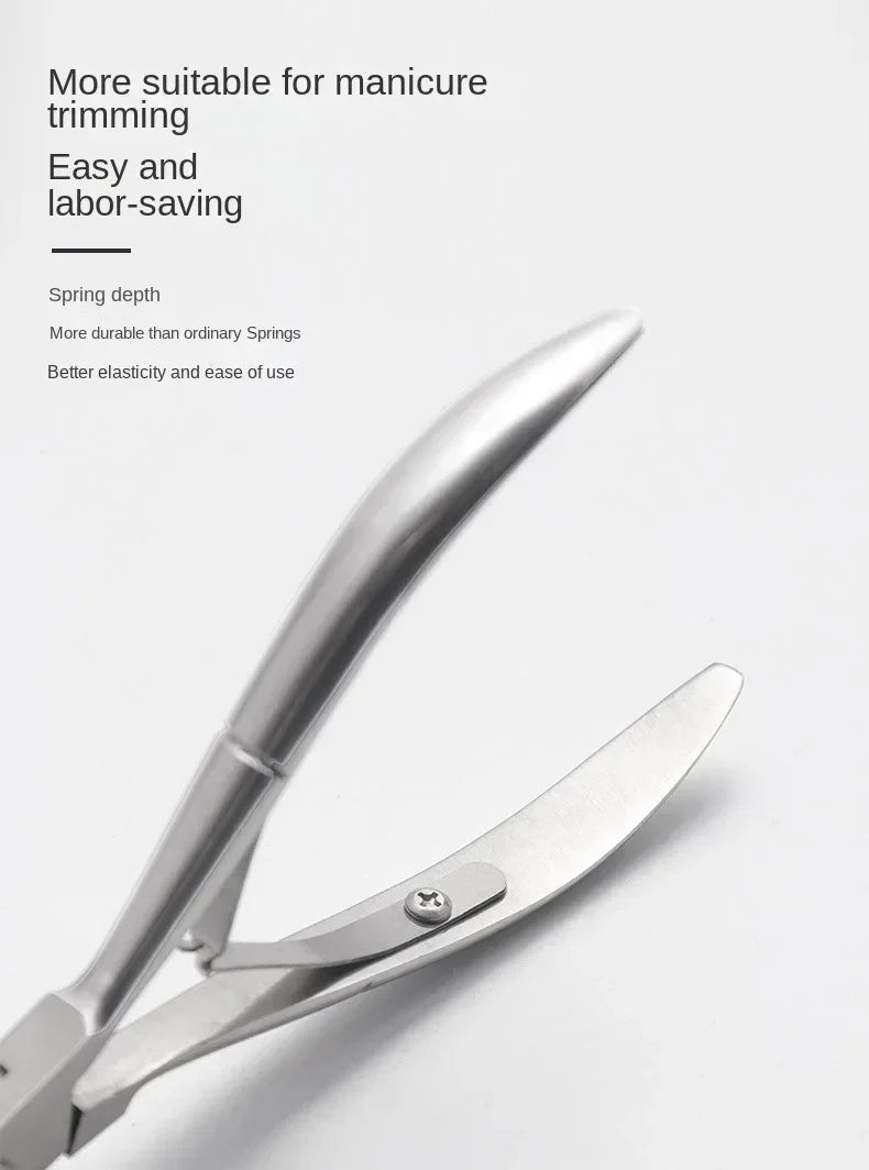 A close-up view of a stainless steel cuticle nipper tool used for manicuring.