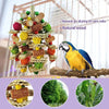 A wooden parrot swing toy made from corn cobs and natural wood, with a blue and yellow parrot perched on a branch.