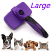 A purple multi-functional pet grooming comb and scratcher set with a black handle, shown next to several dogs.