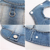 Close-up views of a classic blue denim dog jacket featuring a D-ring leash attachment.