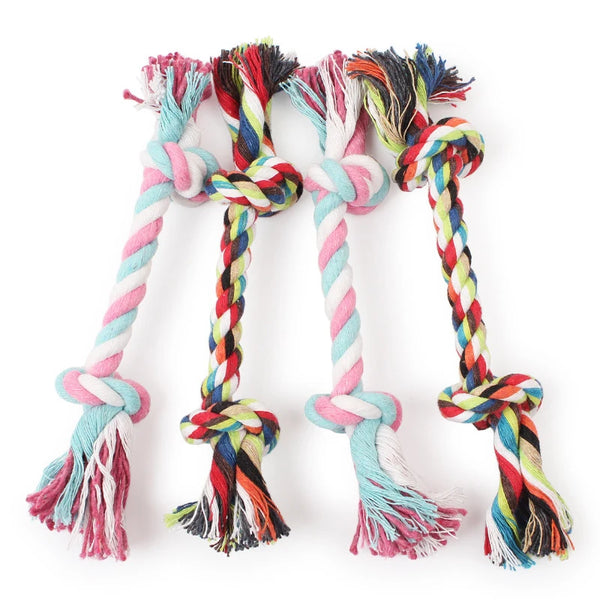 Three bundles of colorful cotton rope dog chew toys with tassels