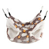A cozy plush pet hammock with a white and gray patterned fleece interior.