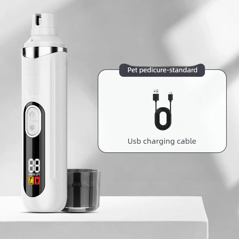 A white pet pedicure tool with a silver pump and LED display, next to a glass, showing a USB charging cable.