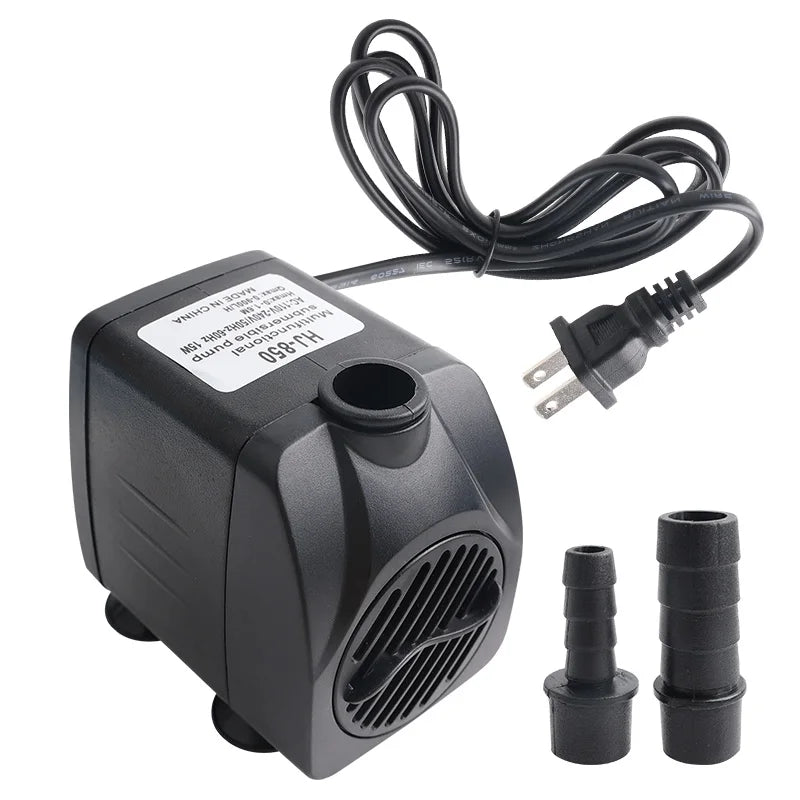 A black submersible water pump with a cord and fittings is shown on a white background.