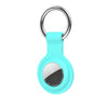 A light blue silicone protective cover for an AirTag attached to a metal keychain ring.